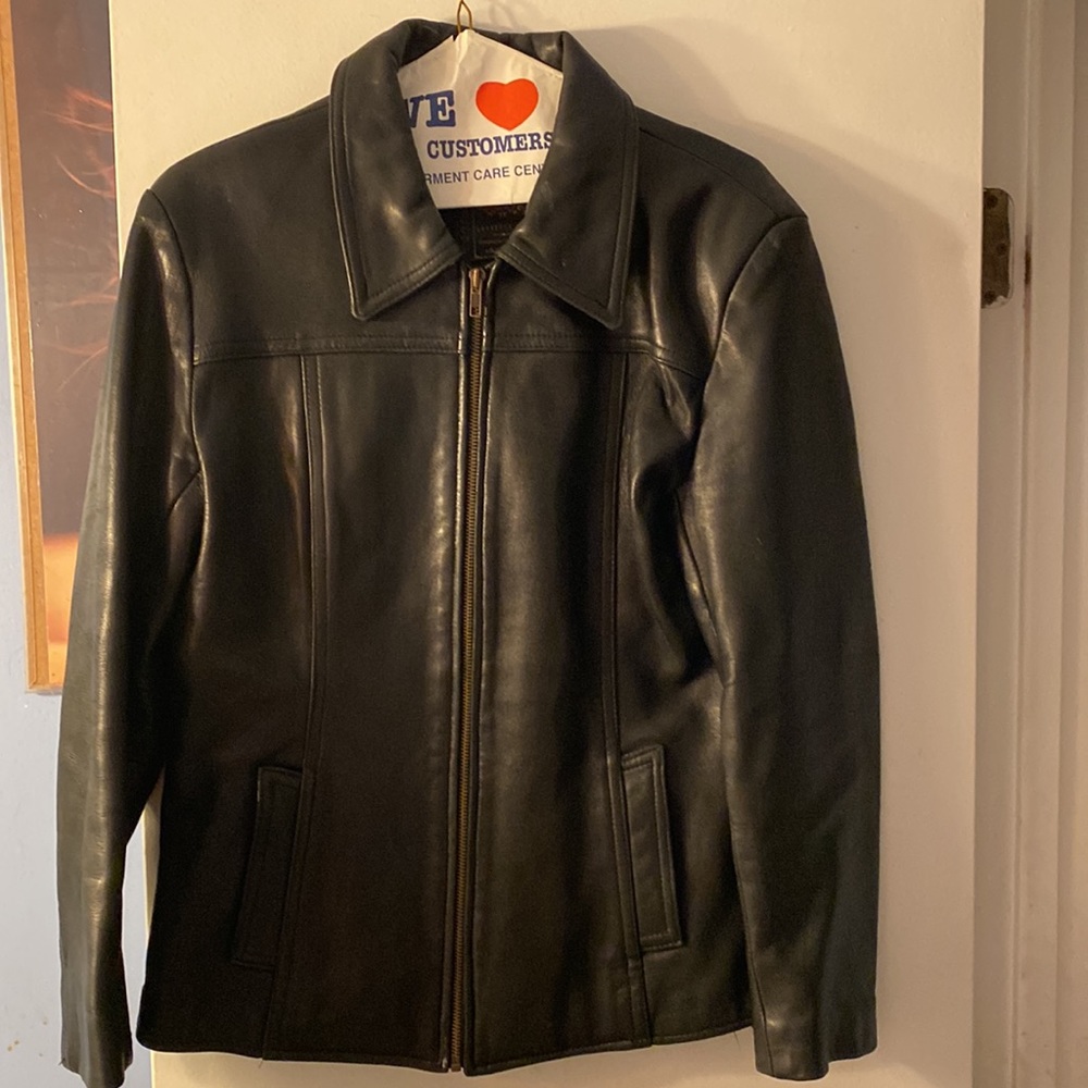 Women’s black leather jacket. Good condition, couple of inside liner frays.